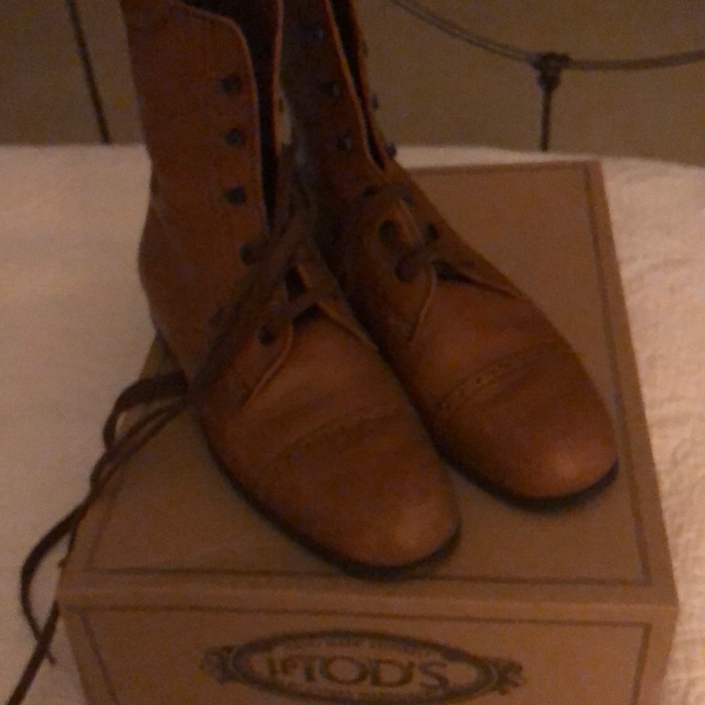 Tods handmade leather lace up boots